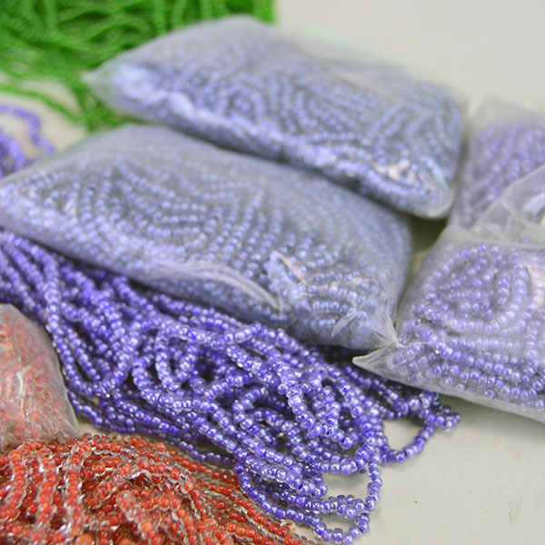 Seed Beads- 23 oz Assorted 11/0 lot. You will get regular, transparent, color lined, tube, and Czech beads, in assorted colors. Limited Quantities. pictured here are some of the assorted colors showing color lined red, and purple.