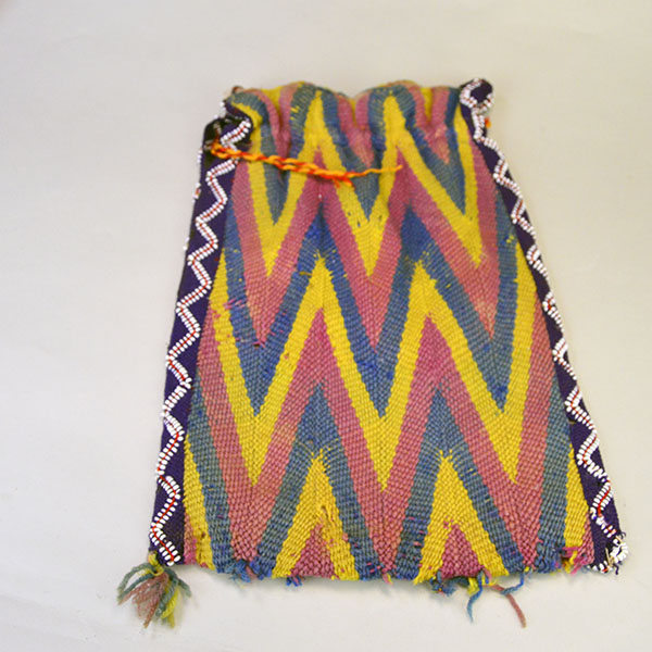 vintage Bag- Wool Yarn Fingerwoven features a soft cotton lining. measures 10" wide by 14" long. few small areas of yarn show age‑related deterioration.