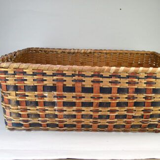vintage Basket- Ash Large, 24" long by 14" wide, and 9" high. splints dyed brown and red to create a simple, classic design. one of a kind.