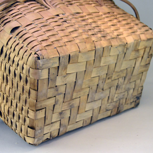 vintage Basket- Ash Picnic Large with lid makes an attractive storage piece. 11 inches high, 19 inches long by 15 inches wide. rim has broken in places. the bottom showing water stains.