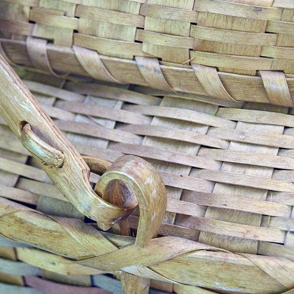 Basket- Large Ash Picnic with lid. basket stands 11"high with the lid on (not including the handle) and measures an impressive 22" long by 15" wide. how the handles are held on.
