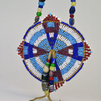 Beaded rosette necklace on brain tanned leather front view.