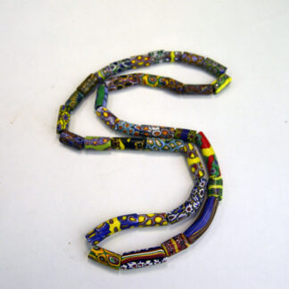 Trade Beads- 34 Millefiori Beads, some with beautiful natural curves, each measuring approximately 15mm to 35mm in length. One of a kind.