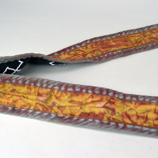 Bag- Wool Shoulder Beaded features beadwork and hand‑sewn ribbon edging. measures approx. 8.5" tall x 9" wide, shoulder strap measures 29" long. the strap showing the paint from the last customer.