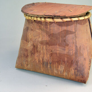 Fabulous birchbark basket with lid features hand‑etched animal designs around the container. container stands approx. 8.5"tall, 10" long by 7"wide.