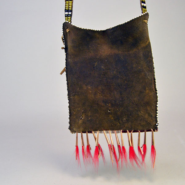 Hunting Bag Underwater Panther Design is constructed from walnut‑dyed Braintanned. measures approximately 8 by 7.5 inches. One of a Kind. The back.