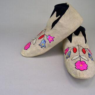 Vintage Moccasin- Floral Quilled showcase a floral quillwork design on Braintanned deerskin, rawhide soles. approx. women's size 8. One of a Kind.
