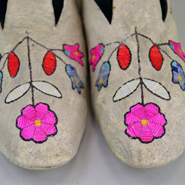 Vintage Moccasin- Floral Quilled showcase a floral quillwork design on Braintanned deerskin, rawhide soles. approx. women's size 8. One of a Kind. the quill floral design.