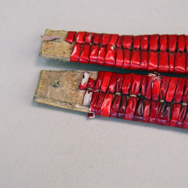 antique set of four Ornament- Quilled Tipi features vivid red‑dyed quills. Each piece measures approx. 5 inches long and 3/4 inch wide at its widest point. The ends