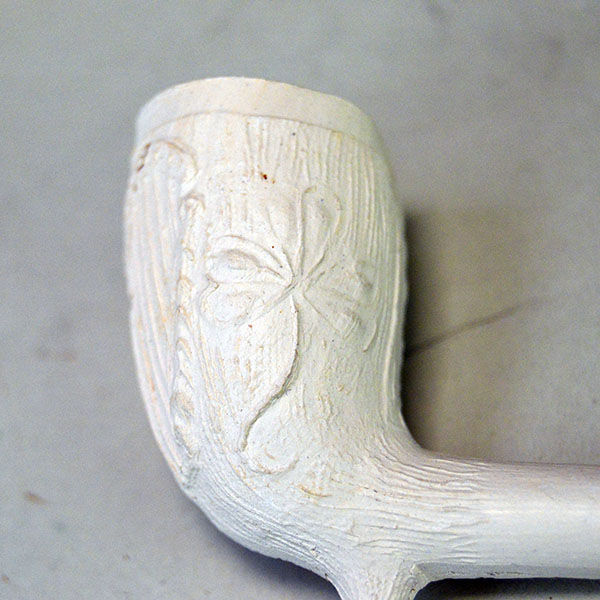 Add this Pipe- 5" Clay to your collection today. From natural white clay designs that vary from pipe to pipe. Limited stock, sold per pipe. The other side of the design.
