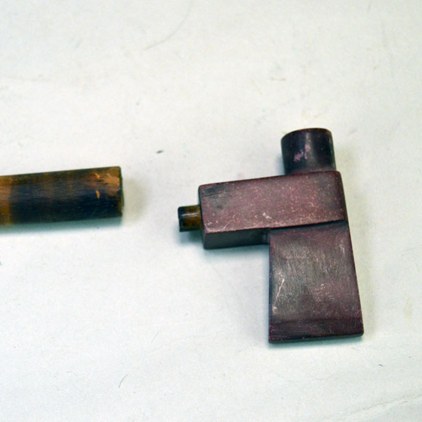 Add this small Pipe – Carved Catlinite Tomahawk Shape to your collection. Catlinite bowl measures approx. 2"long and 1.75" wide. approx. 6.5" long overall. the side of the pipe bowl.