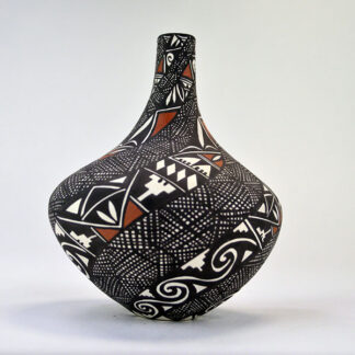 Pottery- Acoma Style Vase will make a beautiful addition to your collection. signed ‘Sandra Victorino.’ vase stands approx. 4.5" tall. one of a kind.