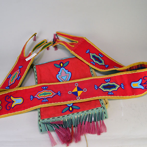 This Bag- Great Lakes Style showcases bold 11/0 seed bead floral and geometric designs. measures approx. 10" wide X 11" long, and the strap 28.5 " long.