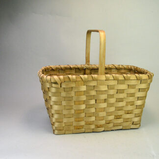 Contemporary Basket- Ash with Handle showcases clean craftsmanship and a classic, functional form. Measuring  approx. 16" across and 8" high.
