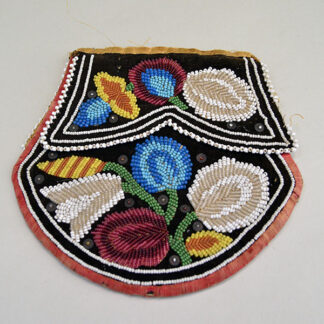 Add this antique Beaded Iroquois Style Bag to your collection! made from black velvet & red bias tape edging. Approx. 6.5″ long by 6″ at its widest point.