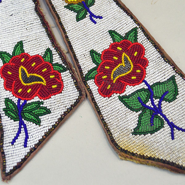 Add this antique decorative beaded necktie and collar to your collection. vibrant floral beadwork designs on both pieces. One of a Kind. the floral bead work matching on the collar and the tie.