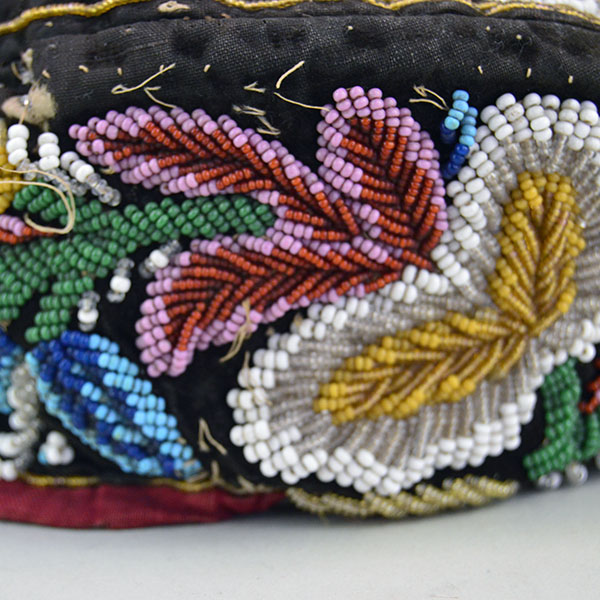 Antique Hat- Antique Beaded Glengarry, brown velveteen cap with a classic Iroquois‑style floral motif. hat shows wear, some bead loss. One of a Kind. more of the beaded work on the side.