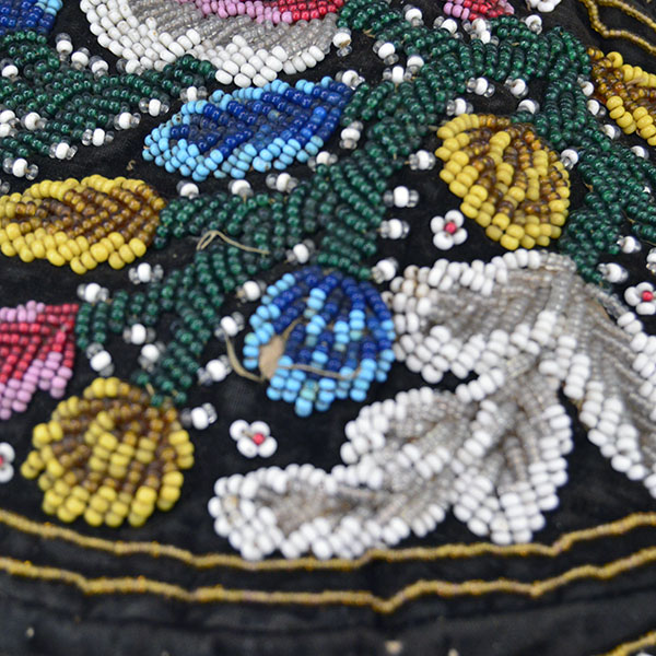 Antique Hat- Antique Beaded Glengarry, brown velveteen cap with a classic Iroquois‑style floral motif. hat shows wear, some bead loss. One of a Kind. The flora design on top.