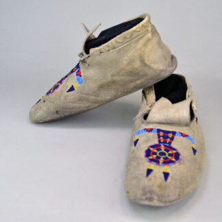 Vintage Moccasins—Keyhole Design Northern Plains style. measure approx., 9.5″ long, 3″ wide, and stand 3.75″ tall (women's size 6). One of a Kind.