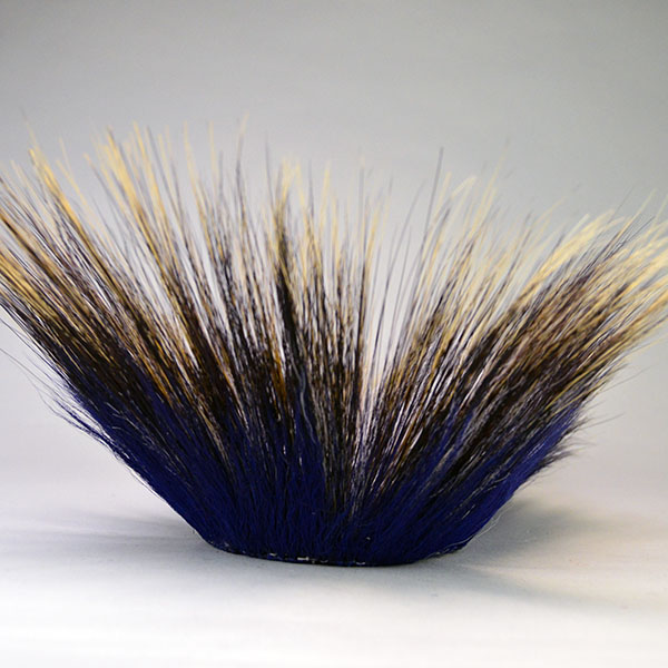 14" Dark Blue Roach is a well‑constructed, eye‑catching piece. Handmade braided‑yarn base, dark blue on the outside and white on the inside. The front of the roach.