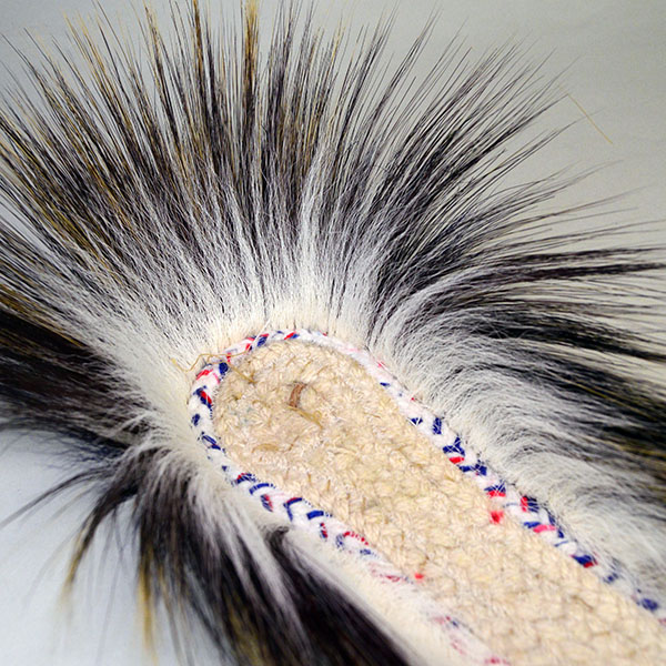 14" Dark Blue Roach is a well‑constructed, eye‑catching piece. Handmade braided‑yarn base, dark blue on the outside and white on the inside. the inside showing the white.