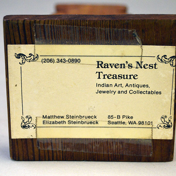 Hand‑carved Totem Pole 9" features a bear on top and a frog at the base. back is etched ‘L. Rudick,’ , is Larry Rudick is a Pacific Northwest carver. the business card on the bottom