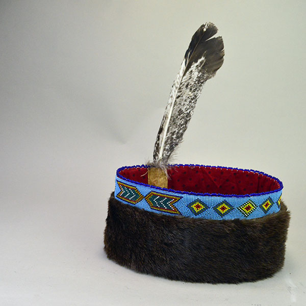Striking Turban- Beaded with Otter will make a standout addition to your regalia. A vintage 1.5‑inch beaded strip on top, 23" in inside circumference.