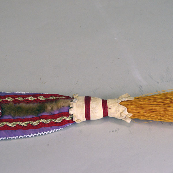 Turban Crafted in Otter Fur features six rosettes measuring between 1.25" x 2.5". approx. 21.5 inches inside circumference, drop measures about 24 inch". The decoration at the end of the drop.