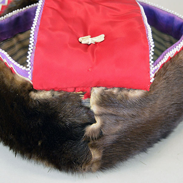 Turban- Handcrafted Otter fur features six rosettes. approximately 22 inches in inside circumference. The drop measures about 26 inches. one of a kind. Where the turban and the drop meet.