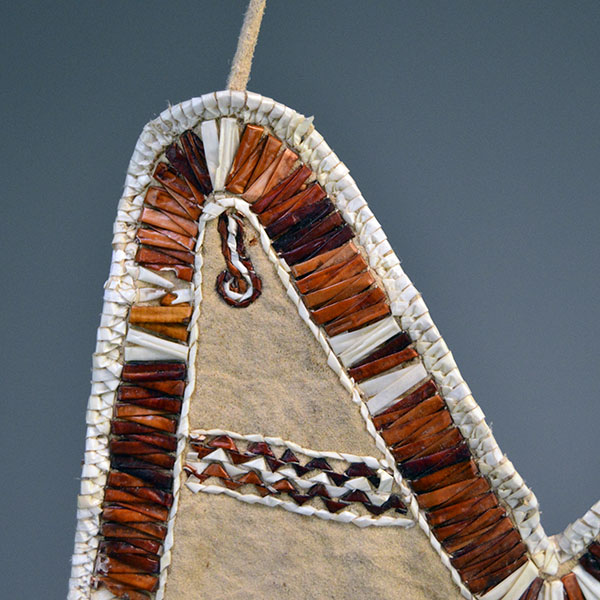 Bag- Quilled Thunderbird Motif with Braintanned leather, otter fur, deer‑hair drops, and antique white pony beads. Measures approx. 14.5" × 6". the other corner.