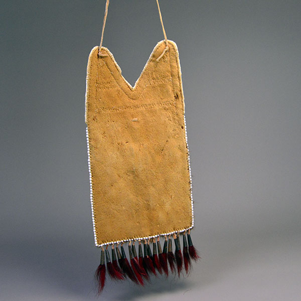 Bag- Quilled Thunderbird Motif with Braintanned leather, otter fur, deer‑hair drops, and antique white pony beads. Measures approx. 14.5" × 6". Pictured here is the back of the bag.