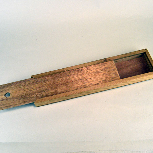 Box- Cedar Slide Top that protects feathers from pests and damage. Smooth lid with no hinges. Exterior measures 17" long, 4" wide, and 1.5" deep.