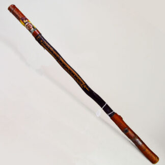 Vintage birch Cane- Indian Head & Leaves, approx. 36" long and 1.5" wide, featuring a hand‑chipped portrait, chipped leaf designs, hand‑painted details.