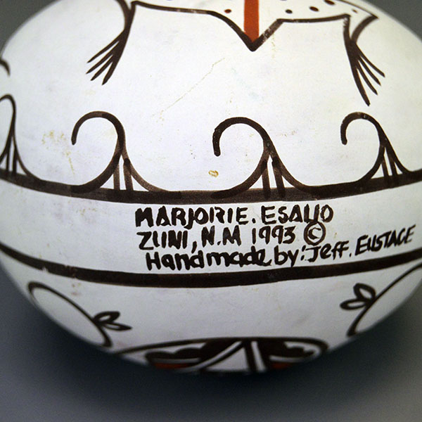 Vintage 1993 Canteen- Hand-painted Frog & Tadpoles by Esalio and Eustace; red/black slip, floral reverse, rounded base; approx. 5″ tall × 4.5″ wide. The Painter and the maker Majorie Esalio and Jeff Eustage. on the bottom.