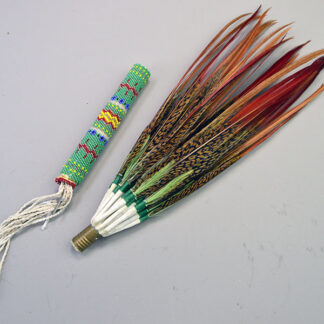 Fan- Red Top Pheasant feathers with green accent feather, peyote‑stitch beaded handle, secure screw‑fit design; this loose fan measures 15.5″ overall.