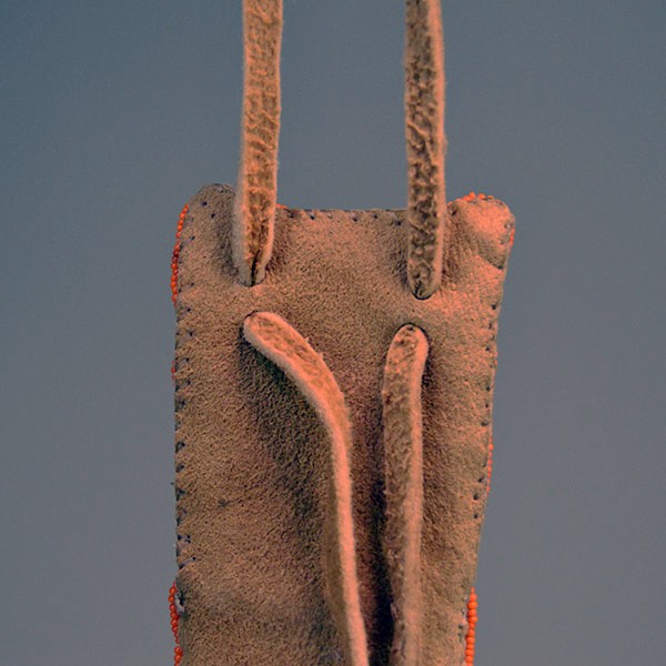 Knife Sheath- Hand Quilled smoked Braintanned deer‑skin with vibrant quillwork, seed‑bead edging, rawhide blade protection, and an adjustable neck strap. The back where you can adjust the neck strap.