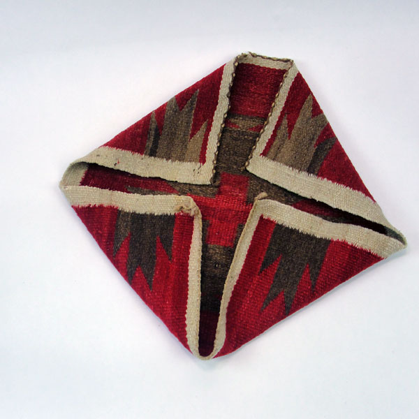 Handmade Navajo Rug Pair with Eye‑Dazzler and geometric designs in rich wool colors. The measurements for both are approx. 18" x 19" and 19.5" x 20". The end of the geometric design rug.