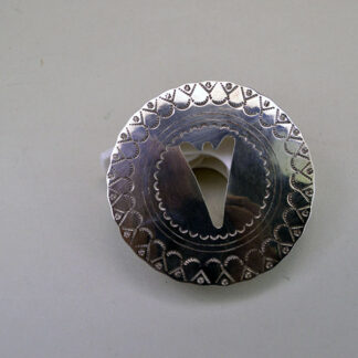 Add this Pin- Concho Arrowhead Silhouette to your collection. A 2.5‑inch German silver concho with hand‑stamped detailing and dual pins for secure.