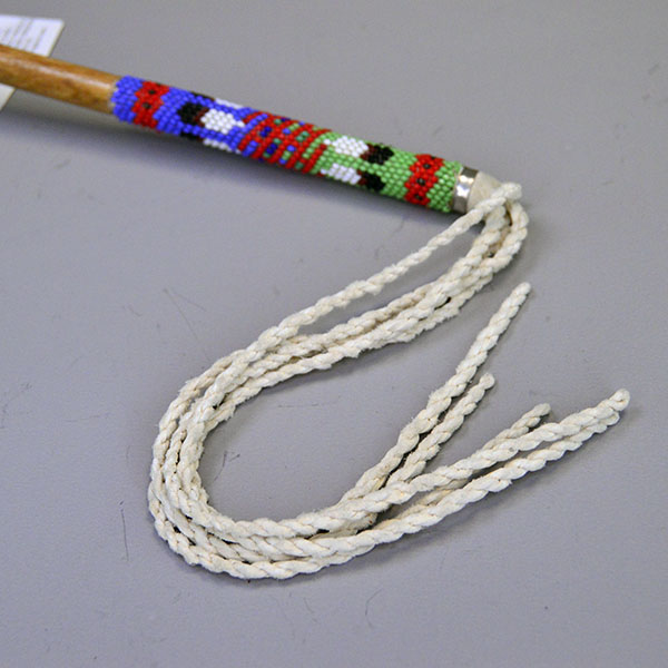 Dance Rattle Gourd- Beaded Handle with a real Bell Gourd, Peyote‑stitched beaded handle, twisted fringe, approx. 22.5 inches long. Beaded handle detail