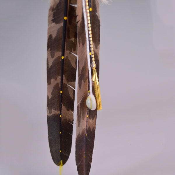 Scalp Feather- Gold Rosette, Hand‑painted eagle feathers, ribbon accents, and cowrie shell tassels. measures approx. 16.5" long.