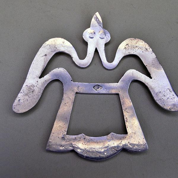 Make this stamped Scarf Slide- Waterbird one of your favorite accessories! This German Silver stamped scarf slide measures 3" x 3". one of a kind. The back with a stamped p on it.