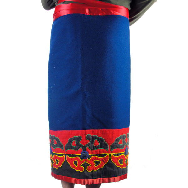 Skirt & Hood Set- Beaded Abstract floral motif, heavy wool, flannel lining, silk accents, bead outlines, approx. 30" × 45" for the skirt and 15" × 9" hood. Pictured here is the back of the skirt.