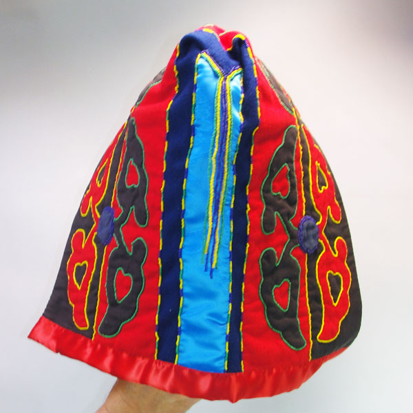 Skirt & Hood Set- Beaded Abstract floral motif, heavy wool, flannel lining, silk accents, bead outlines, approx. 30" × 45" for the skirt and 15" × 9" hood. Here is a picture with the beaded tassels and the blue wool strips with the light blue silk.