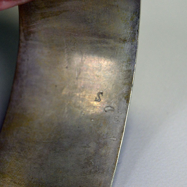 German Silver armband and cuff set with full hand‑stamped designs, maker’s marks “S” and “R,” plus NPW‑III‑1975 on cuffs. One of a Kind. Pictured here is the S stamped on the inside of the armbands.