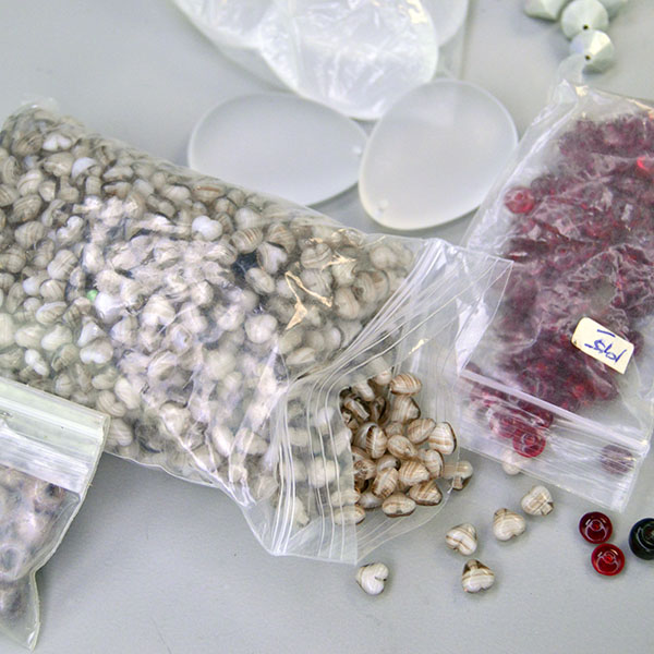38‑oz Bead Lot- Assorted Glass Beads mix featuring heart, diamond, round, and teardrop shapes—perfect for jewelry and craft projects. one of a Kind. Here are the heart shape and the round.