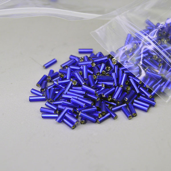 Bead Lot- Bugle Royal Blue are Silver‑lined in a 14‑oz lot. Sized 6mm×1.98mm, perfect for detailed beadwork, bold fringe and vibrant, high‑shine designs.