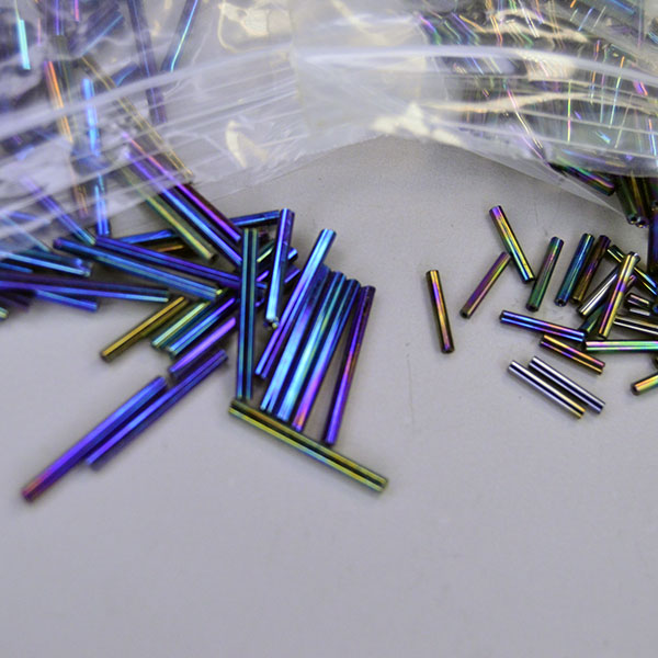 Bead Lot- Iris Rainbow Bugle lot, 15 oz with two sizes for detailed beadwork, textured designs, and flowing fringe. One of a Kind. Here is another angle showing the metallic shine with these bugle beads.