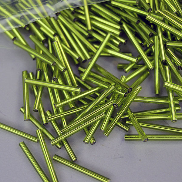 Silver‑lined Bead Lot- Light Green Bugle in a 16‑oz lot, approx. 23mm x 2.38mm. Their narrow diameter adds fine detail. One of a Kind.