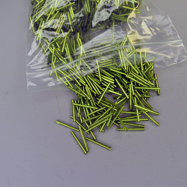 Silver‑lined Bead Lot- Light Green Bugle in a 16‑oz lot, approx. 23mm x 2.38mm. Their narrow diameter adds fine detail. One of a Kind. Here is another angle showing the shine.