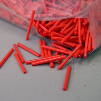 Bead Lot- Red/Orange Bugle in a 1/2‑kilo lot, approx. 23mm. Their narrow diameter adds crisp detail, texture, and dimension to beadwork and jewelry designs.